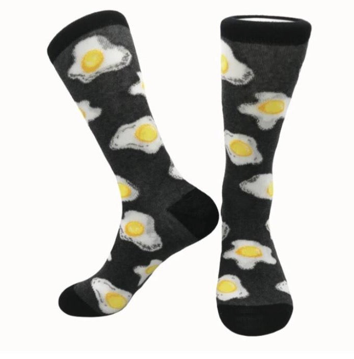 Black socks with sunny side up eggs motifs.