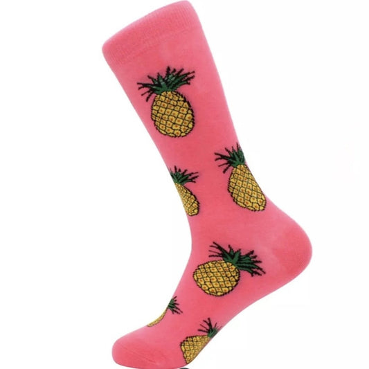 A pair of coral pink socks with pineapple motifs.