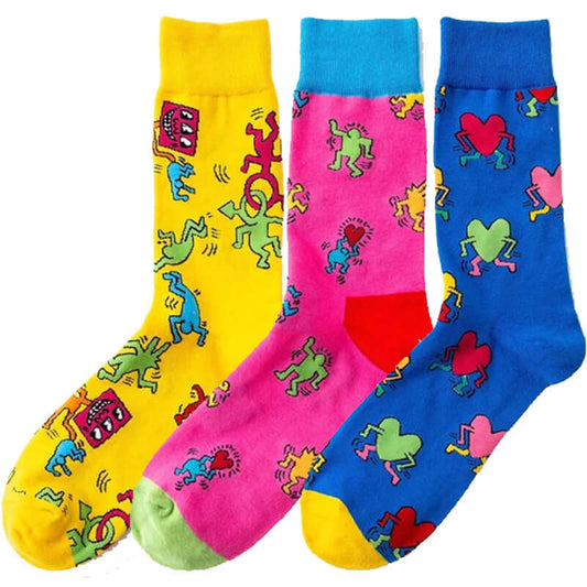 Three pairs of bright Keith Haring inspired socks